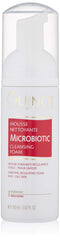 Guinot Microbiotic Cleansing Foam bottle with rich lather for deep cleansing.