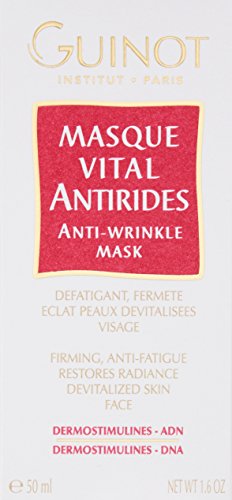 Guinot Vital Anti-Wrinkle Mask spread on skin shows creamy texture for smoothing fine lines.