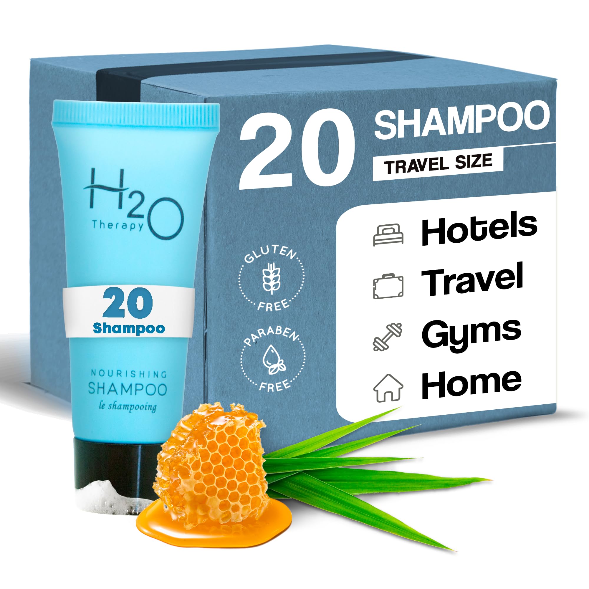 H2O Therapy travel-size shampoo bottles in hotel display for guests