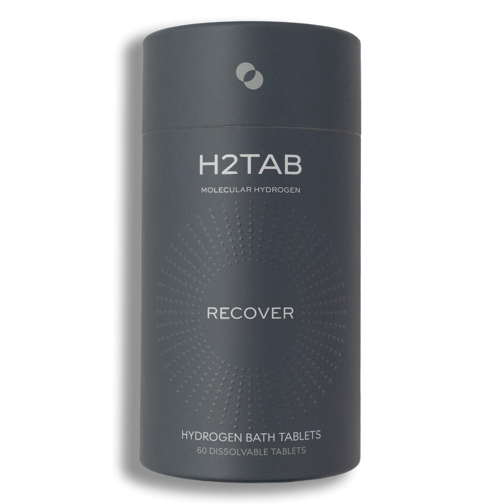 H2TAB hydrogen bath tablet dissolving in water for deep hydration and recovery.