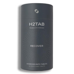 H2TAB hydrogen bath tablet dissolving in water for deep hydration and recovery.