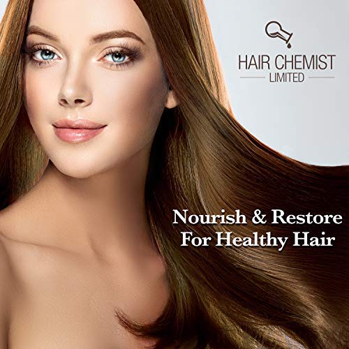Hair Chemist Macadamia Oil Shampoo lather in hand demonstrates cleansing action.