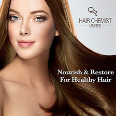 Hair Chemist Macadamia Oil Shampoo lather in hand demonstrates cleansing action.