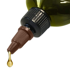 Hair Chemist oil texture on hand demonstrating lightweight absorption benefit