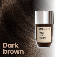 Hair Illusion dark brown fibers application close-up blends naturally with hair.
