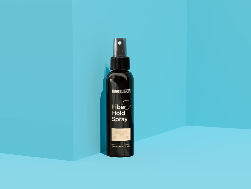 Hair Illusion Fiber Hold Hair Spray mist close-up for even dispersion.