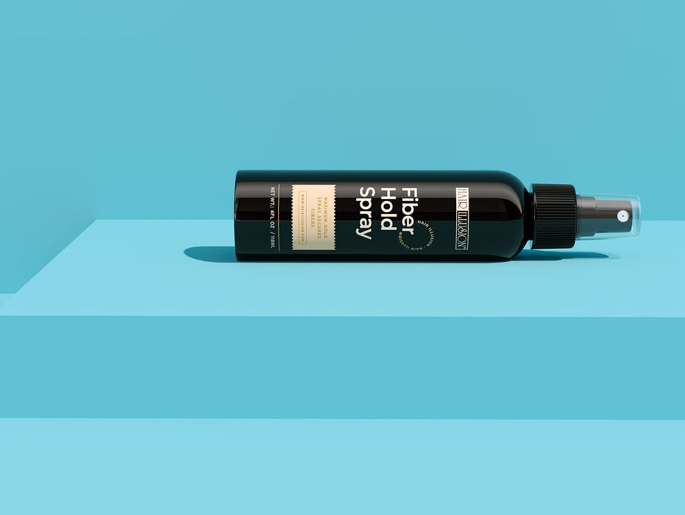 Hair Illusion Fiber Hold Spray dispensing action for easy use.