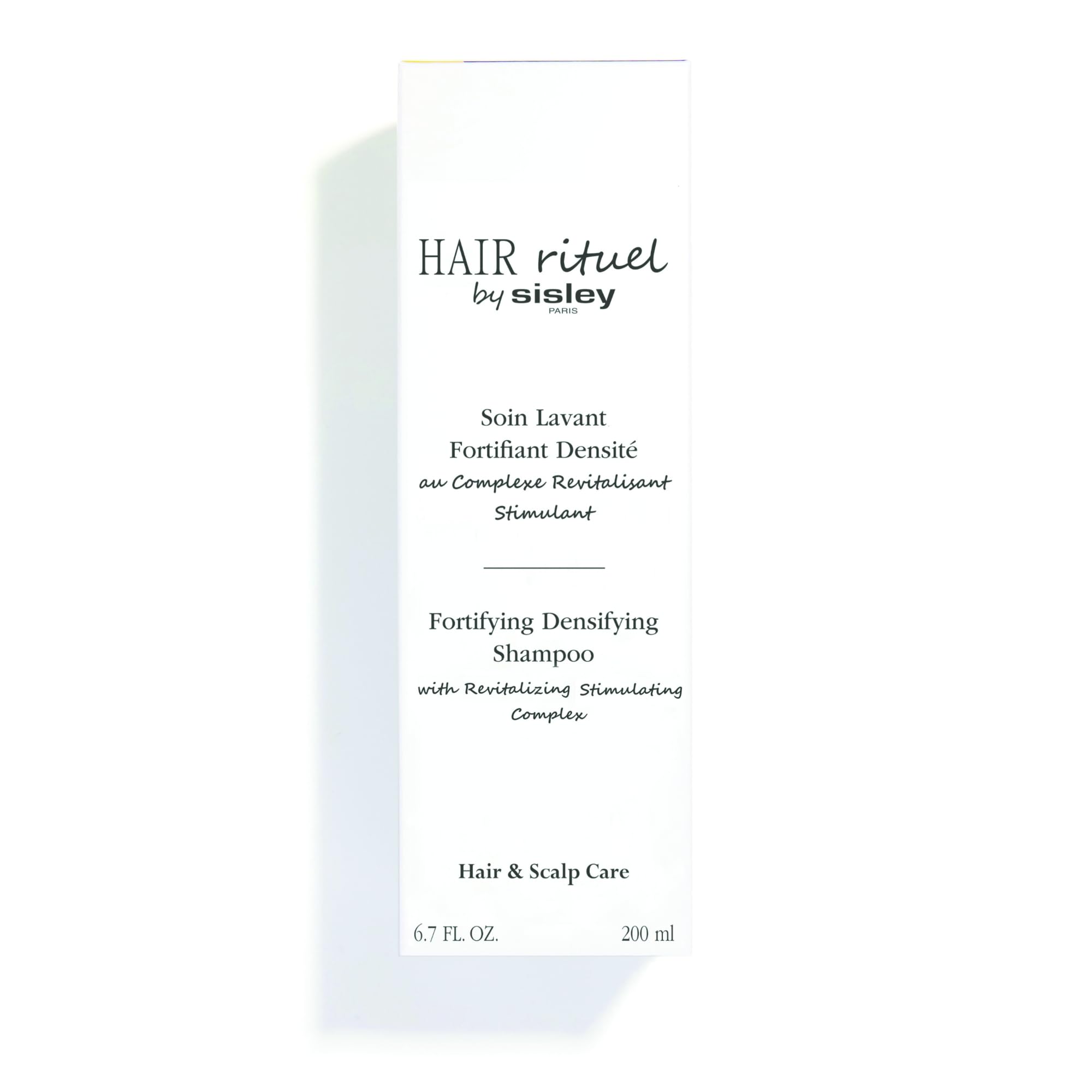 Hair Rituel by Sisley follow-up serum pairing shown for enhanced results.