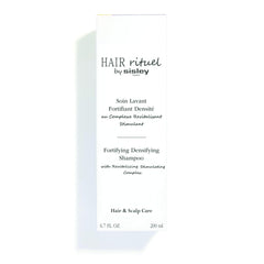 Hair Rituel by Sisley follow-up serum pairing shown for enhanced results.