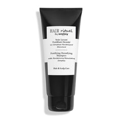 Hair Rituel by Sisley fortifying shampoo bottle for visibly stronger, thicker-looking hair.