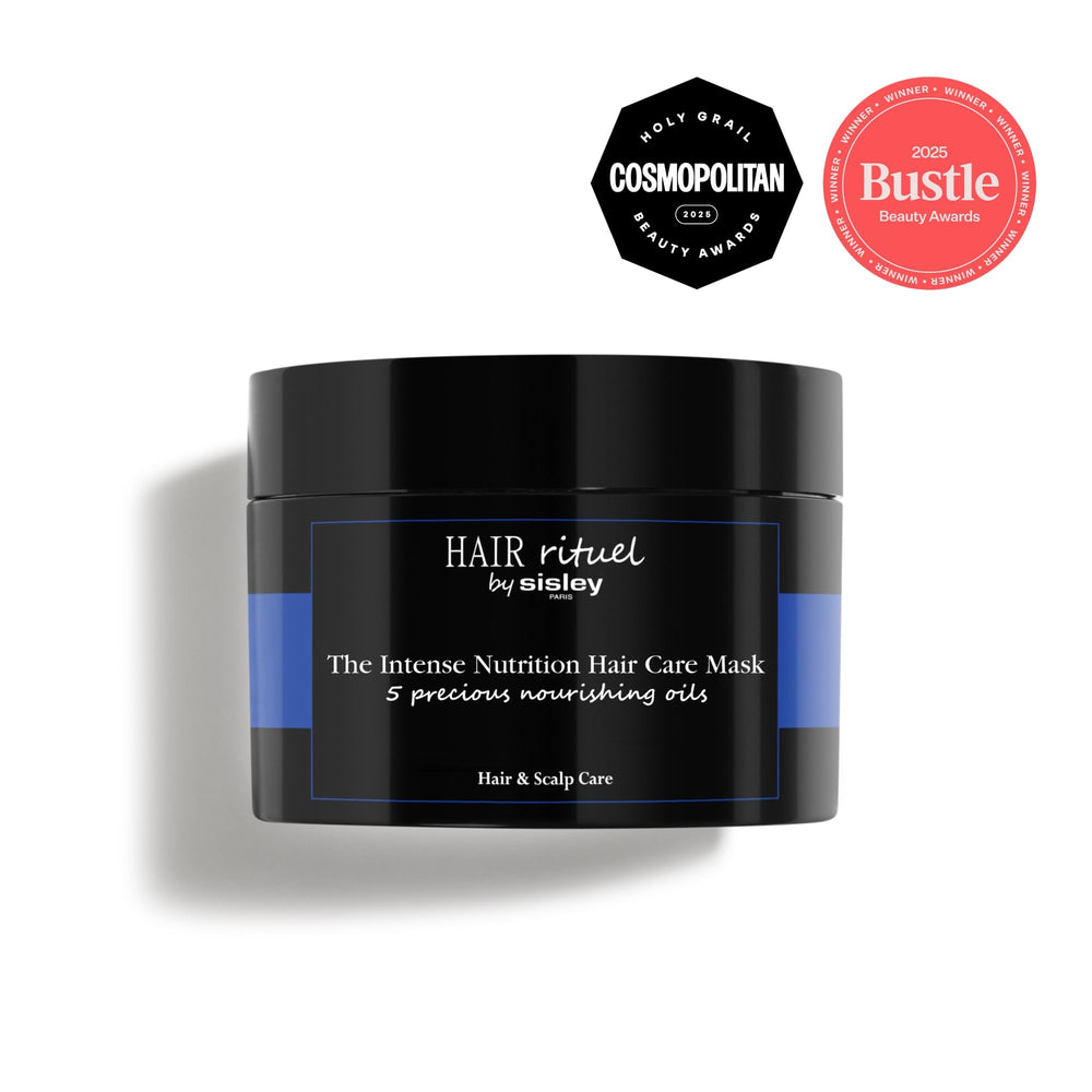 Hair Rituel by Sisley Intense Nutrition Mask applied to damp hair for deep conditioning.