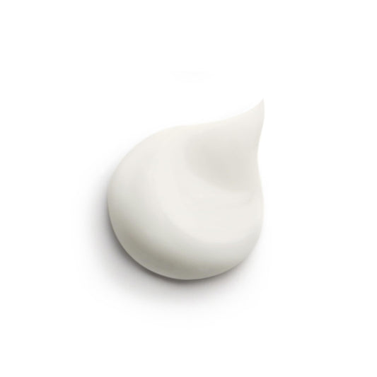 Hair Rituel by Sisley Intense Nutrition Mask cream texture close-up suggests rich nourishment.