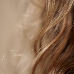 Hair Rituel by Sisley Intense Nutrition Mask close-up reveals radiant shine.