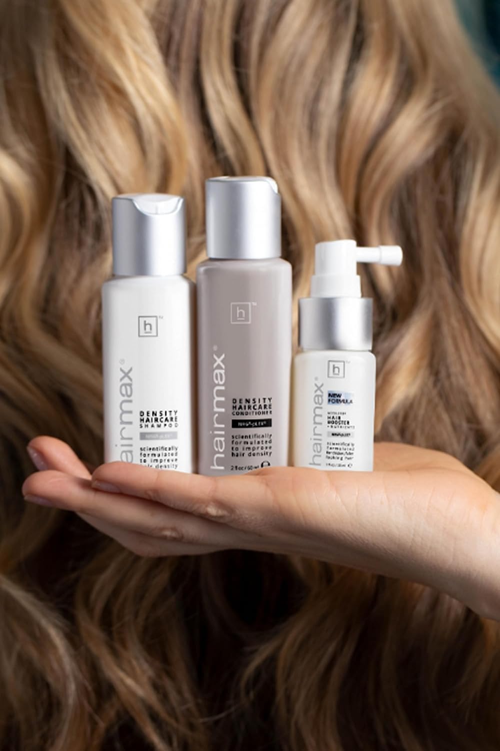Hairmax Density travel pack with compact bottles.
