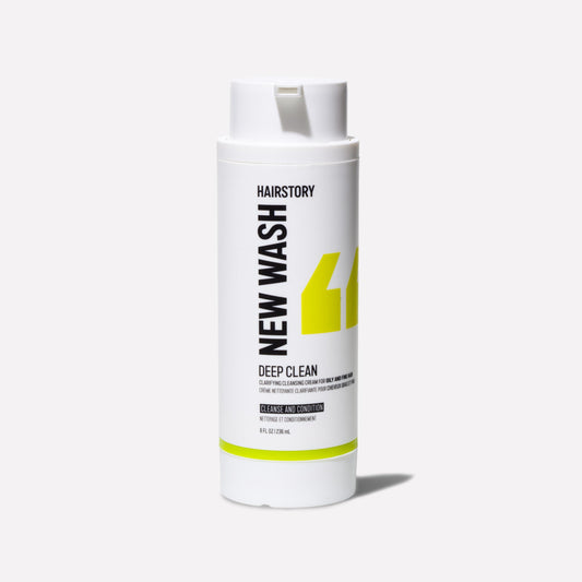 Hairstory New Wash Deep Clean bottle pours to cleanse hair without detergents