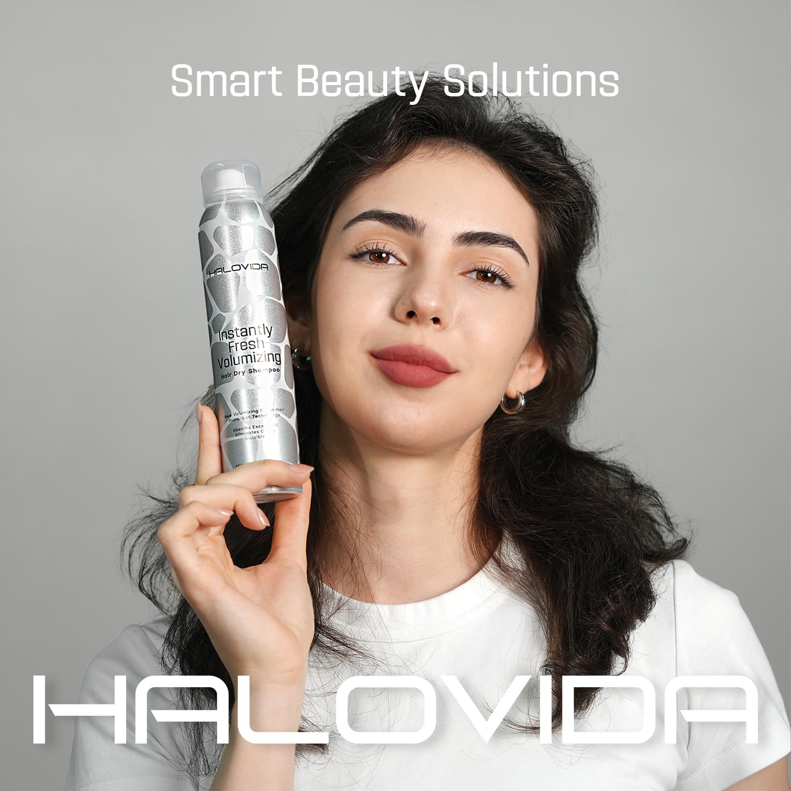 HALOVIDA Dry Shampoo absorbs oil at roots for instant lift.