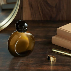 HALSTON Z14 bottle on dresser suggests everyday fragrance ready to wear