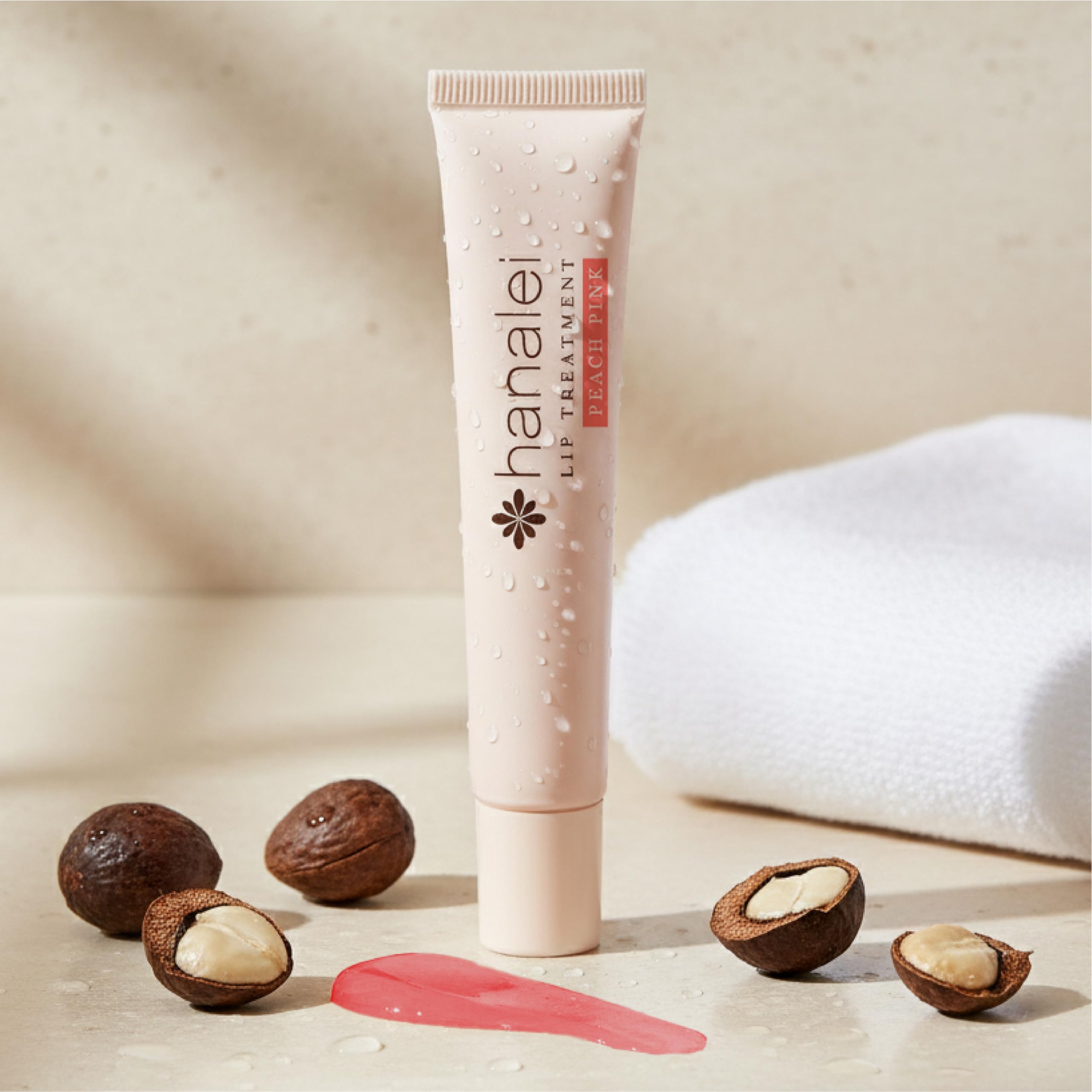 Hanalei Lip Treatment peach-tint balm adds subtle color with moisture.