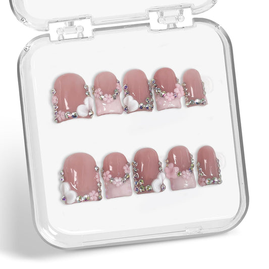 Handmade press-on nails with 3D floral rhinestones for an elegant flair