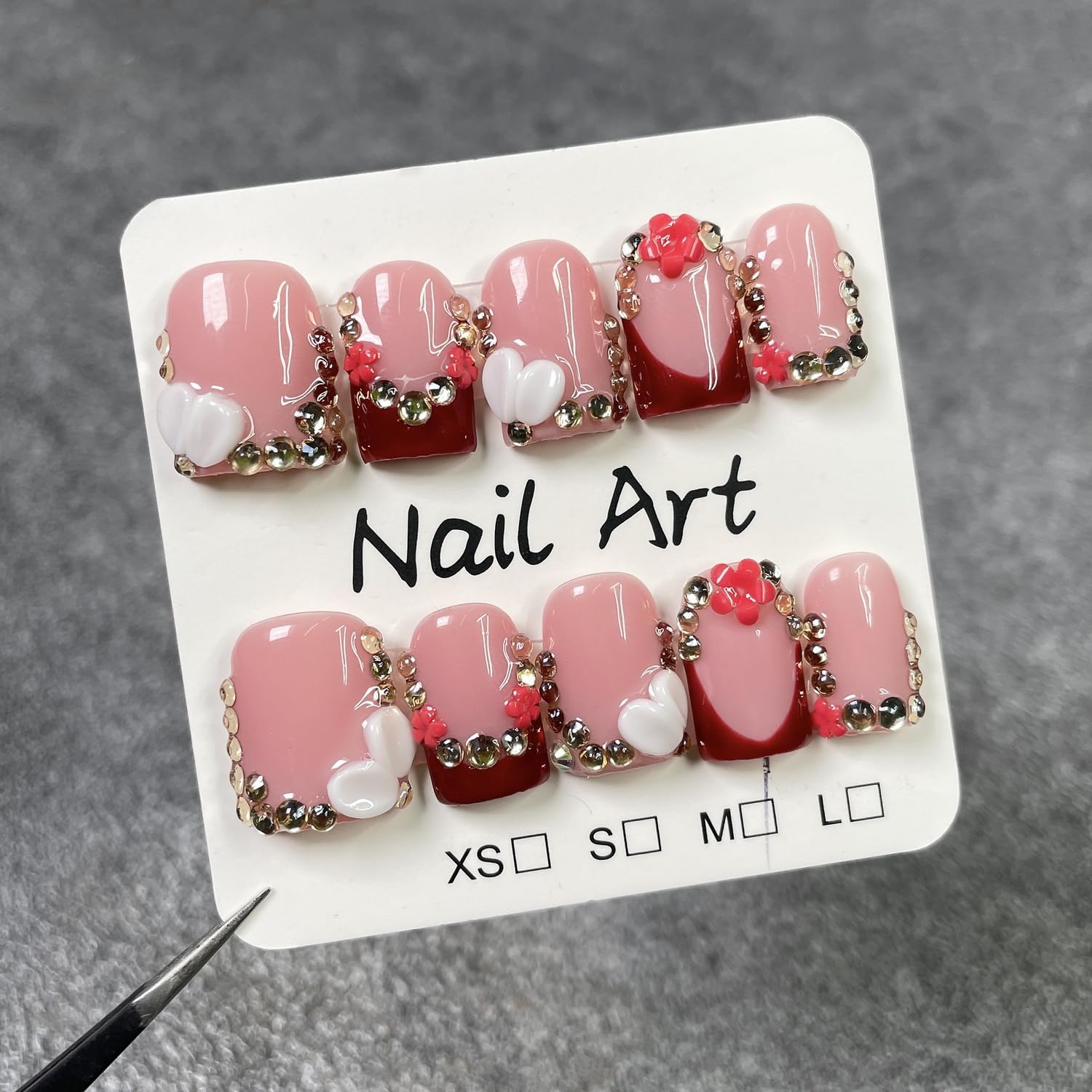 Handmade press-on nails with 3D flower and rhinestones for chic glam.