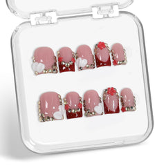 Handmade press-on nails with red French tip for elegant daily wear.