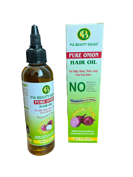 Handmade Onion Hair Oil being applied to scalp showing nourishing pre-shampoo care