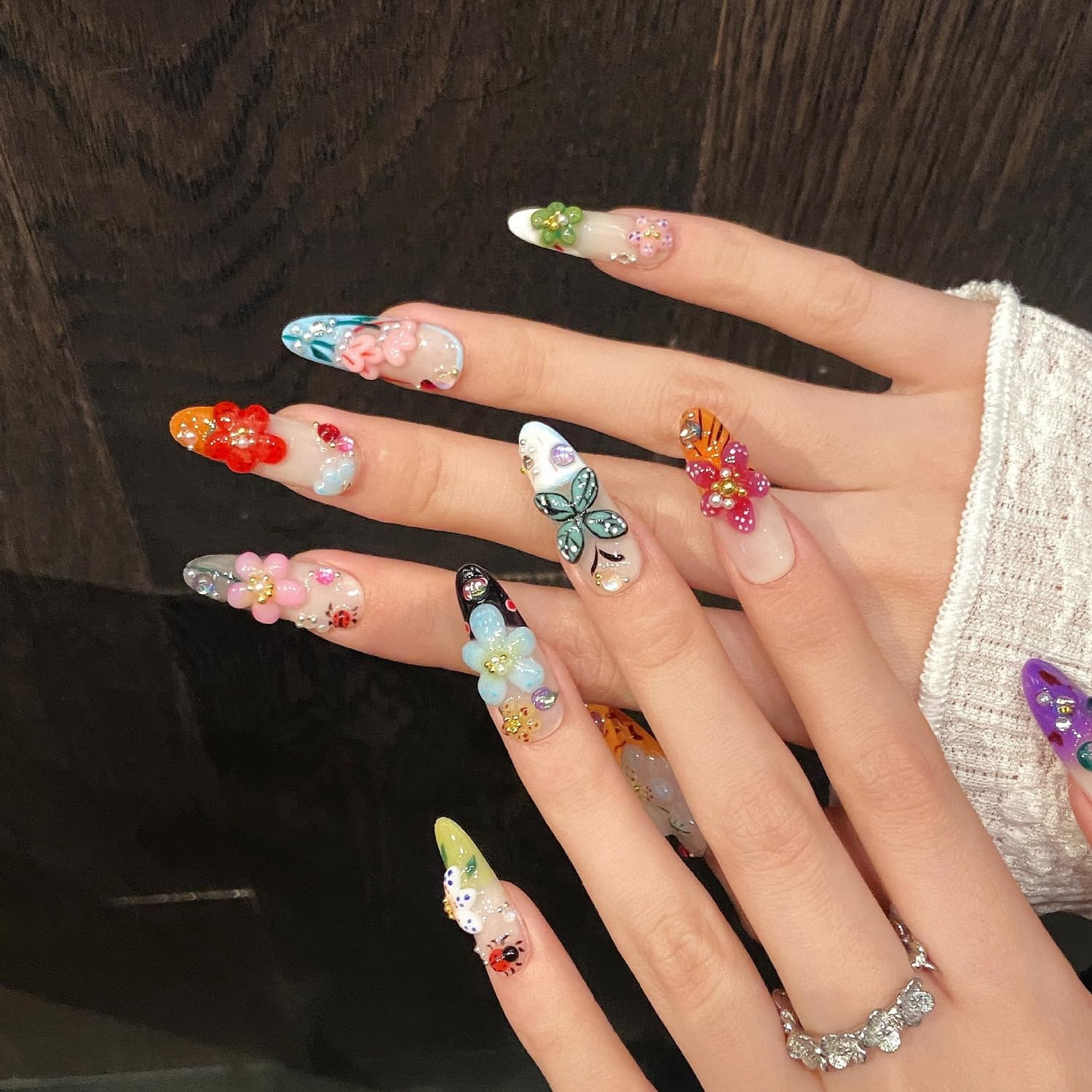 Handmade almond-shaped acrylic nails offer durable, salon-like wear.