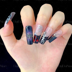 Handmade press-on nails black French tip long square for a chic party look.