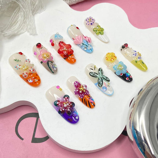 Handmade press-on nails showcasing glossy rhinestones detail for chic sparkle.