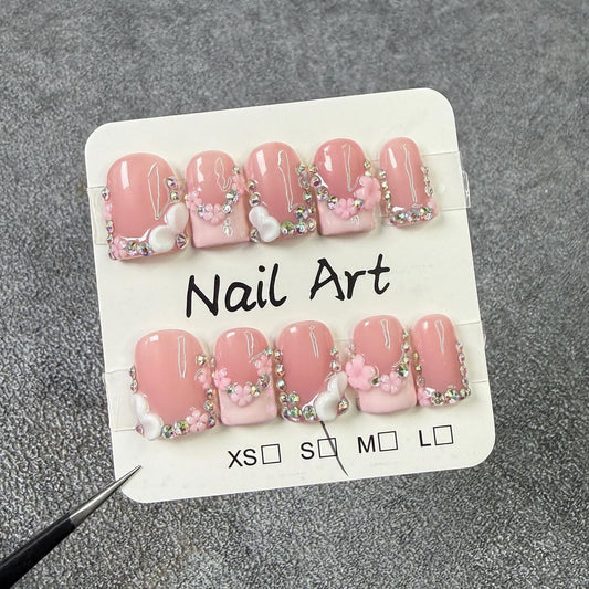 Handmade Press-On Nails with rhinestones for chic event-ready looks.