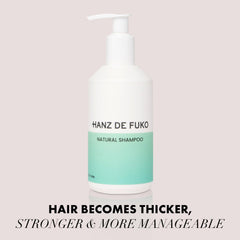 Hanz de Fuko bottle with shea butter emphasizes conditioning benefits.