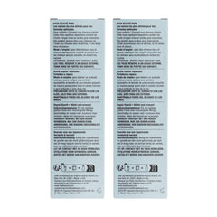 HASK Argan Repairing Hair Oil on dresser with two vials ready