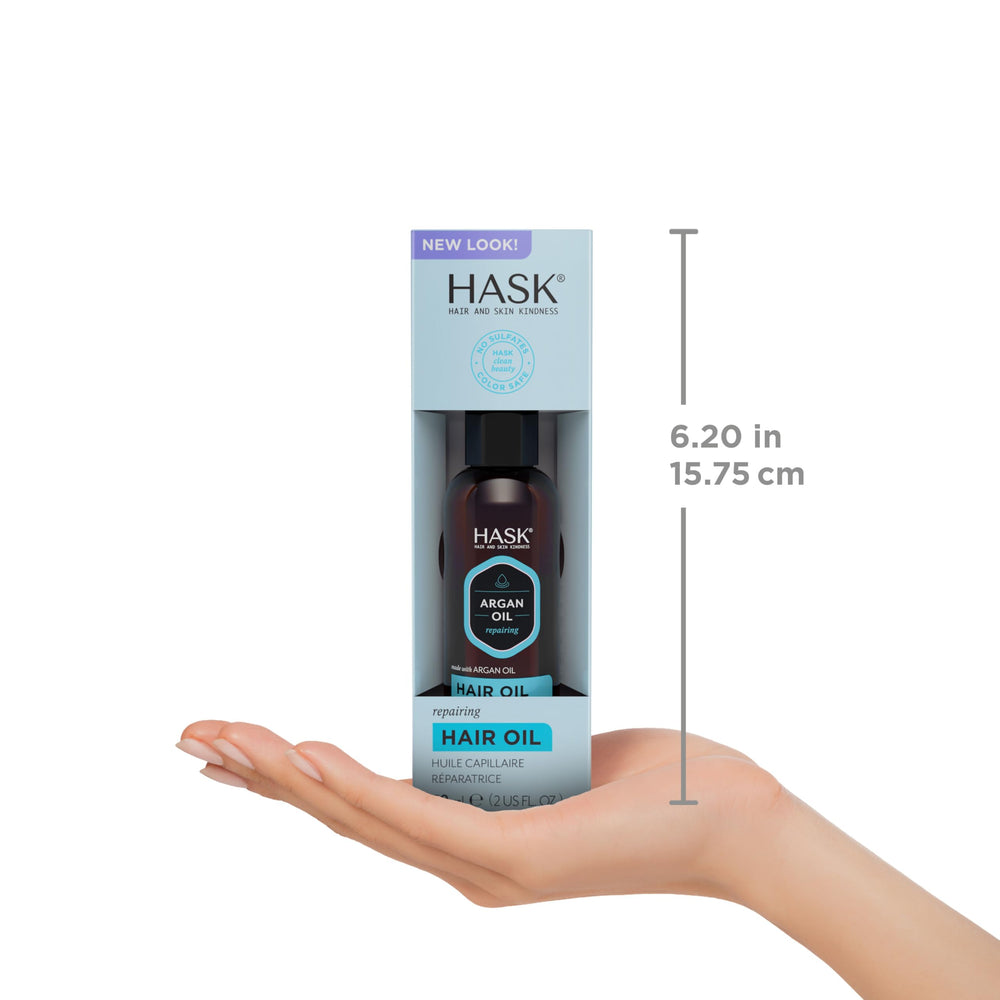 HASK Argan Repairing Hair Oil 2-pack on a dresser