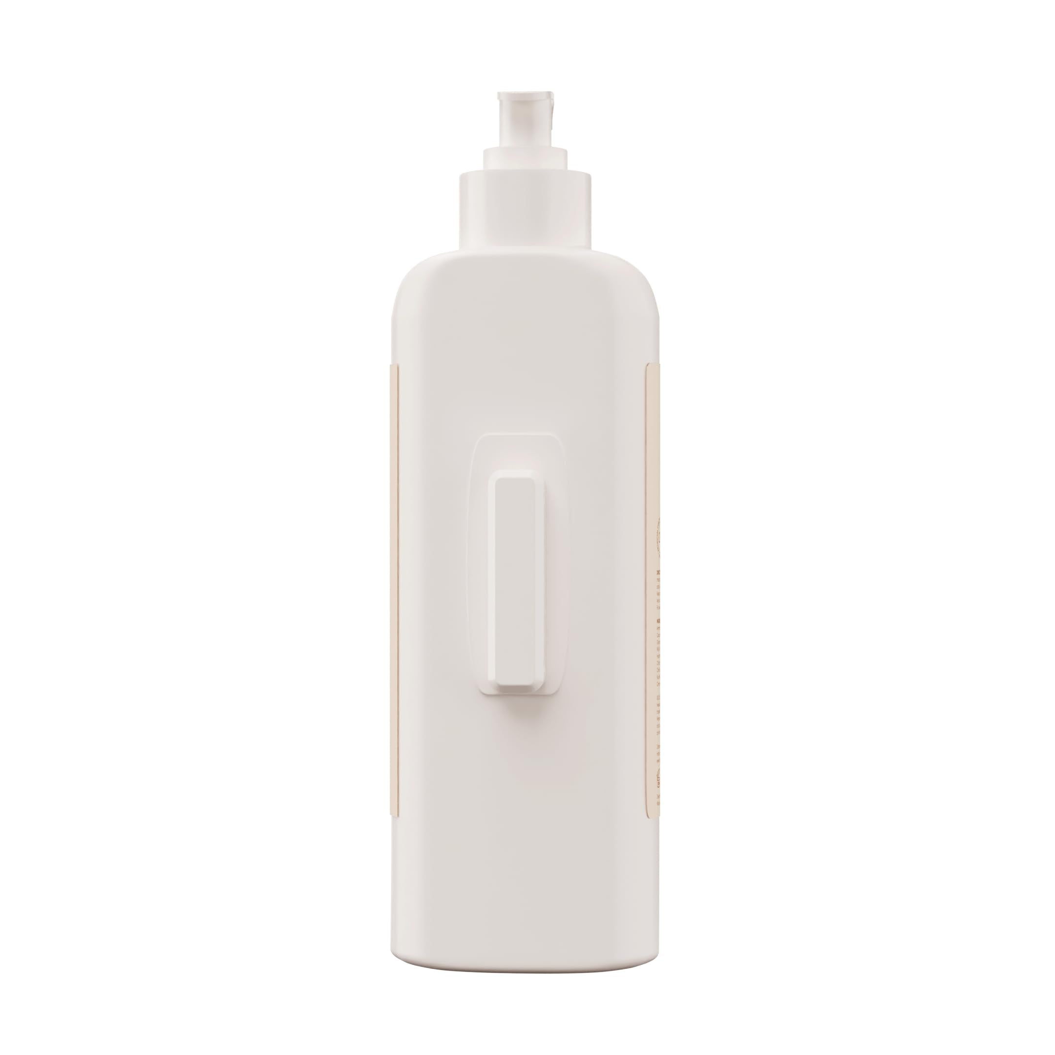 Hawaiian Tropic shampoo on wall offers quick guest access.