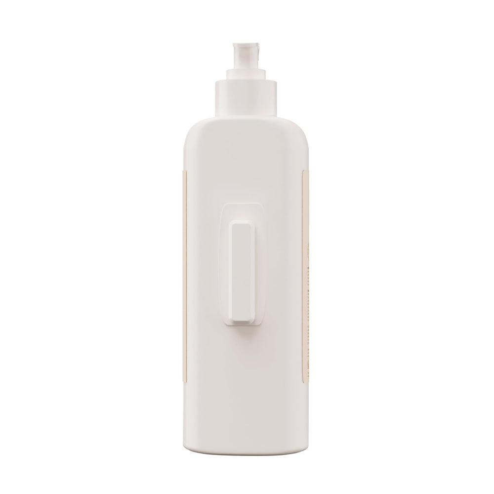 Hawaiian Tropic shampoo on wall offers quick guest access.