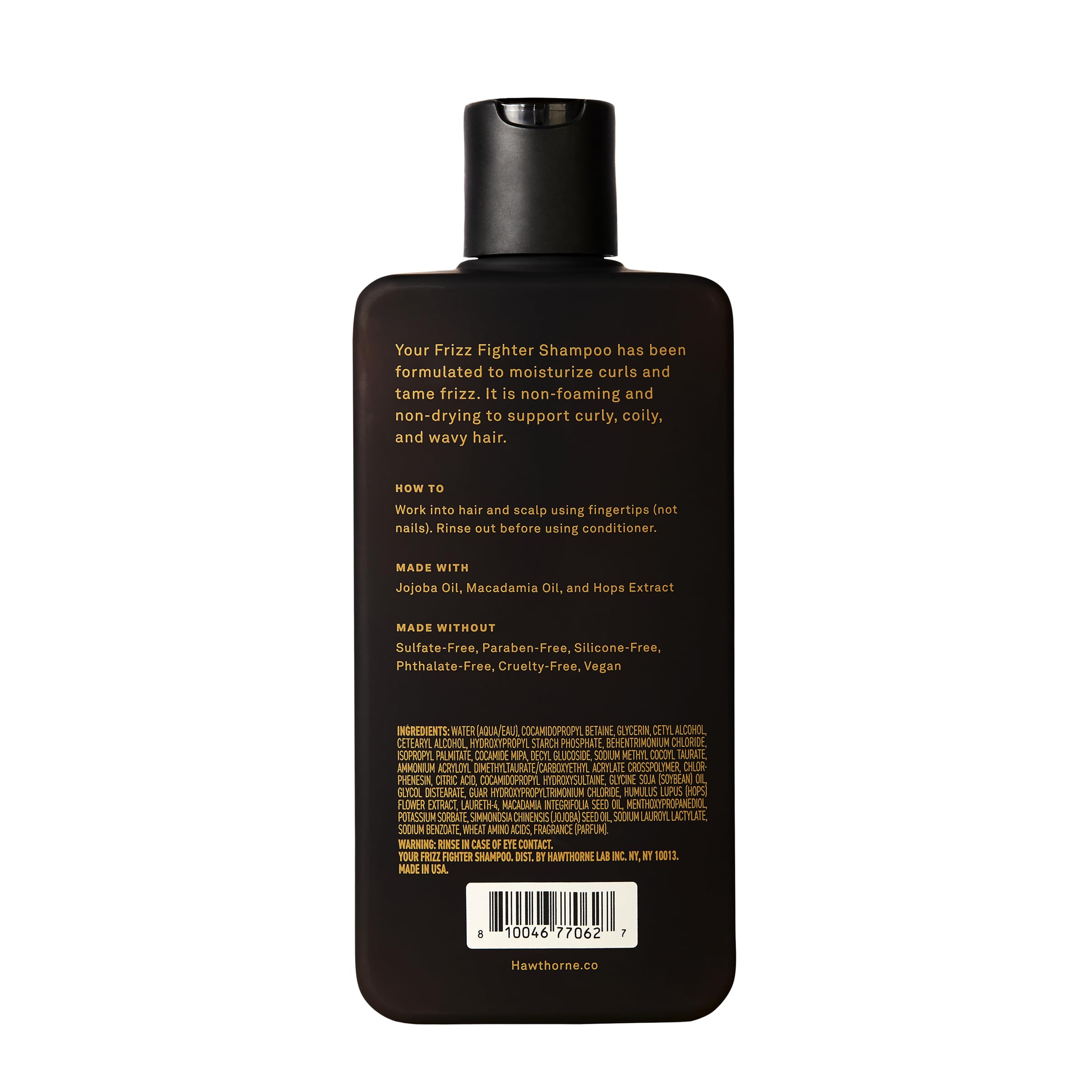 Man using Hawthorne Frizz Fighter Shampoo for curly hair care.