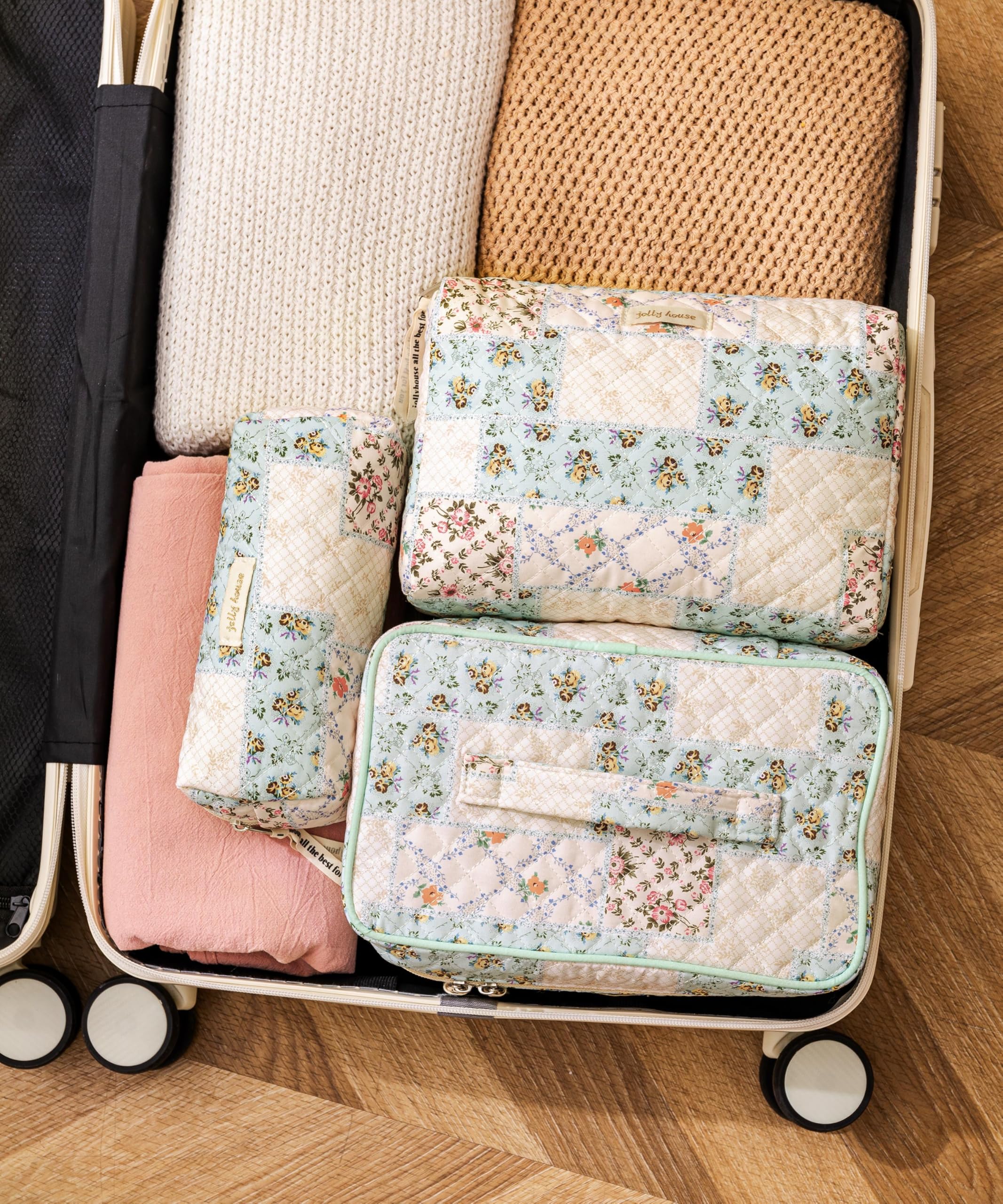 HBselect makeup bag opened to reveal organized compartments and products.