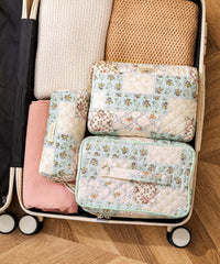 HBselect makeup bag opened to reveal organized compartments and products.