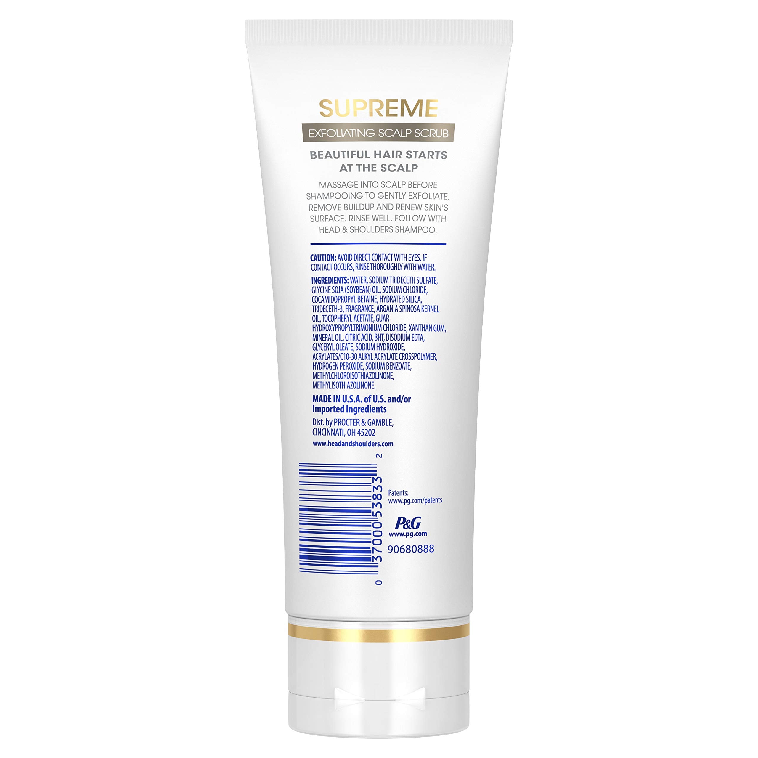 Head & Shoulders Supreme exfoliating scrub being massaged onto the scalp before shampoo.