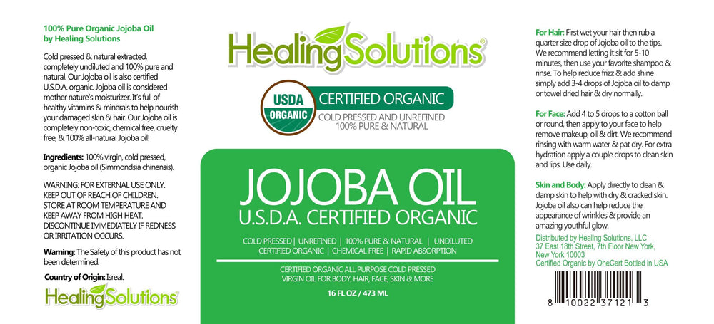 Healing Solutions Jojoba Oil glass bottle closeup showing purity for skin.