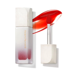 Heart Percent Dote On Mood Glow Tint bottle being applied for glossy hydration