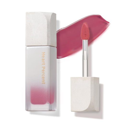 Heart Percent Dote On Mood Glow Tint Plum Mauve bottle shows moisturizing color for daily wear.