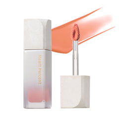 Heart Percent Just Coral lip tint swatch shows vibrant, long-lasting color.
