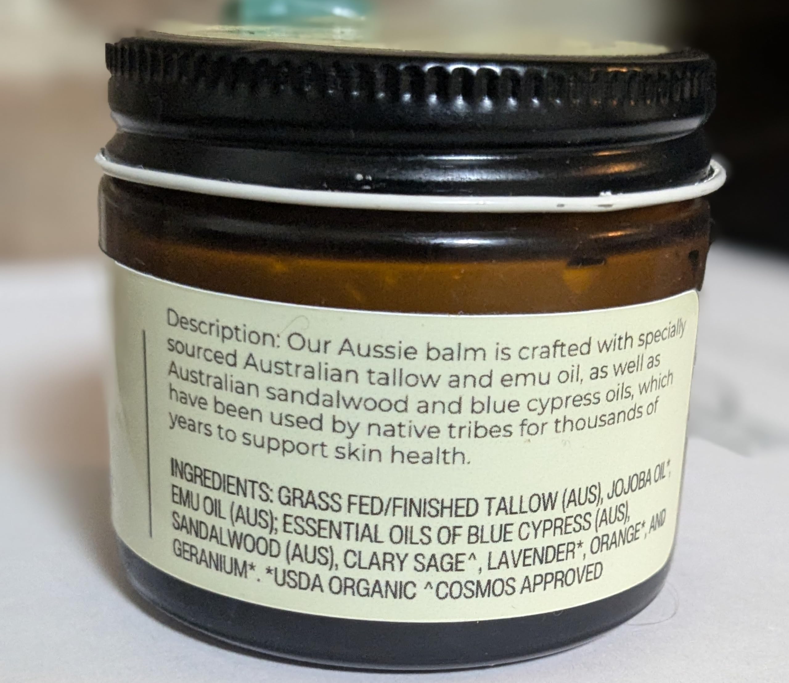 Hearth and Homestead Blue Outback Balm ingredient-oil mix displayed for a luxurious, multi-oil formula.