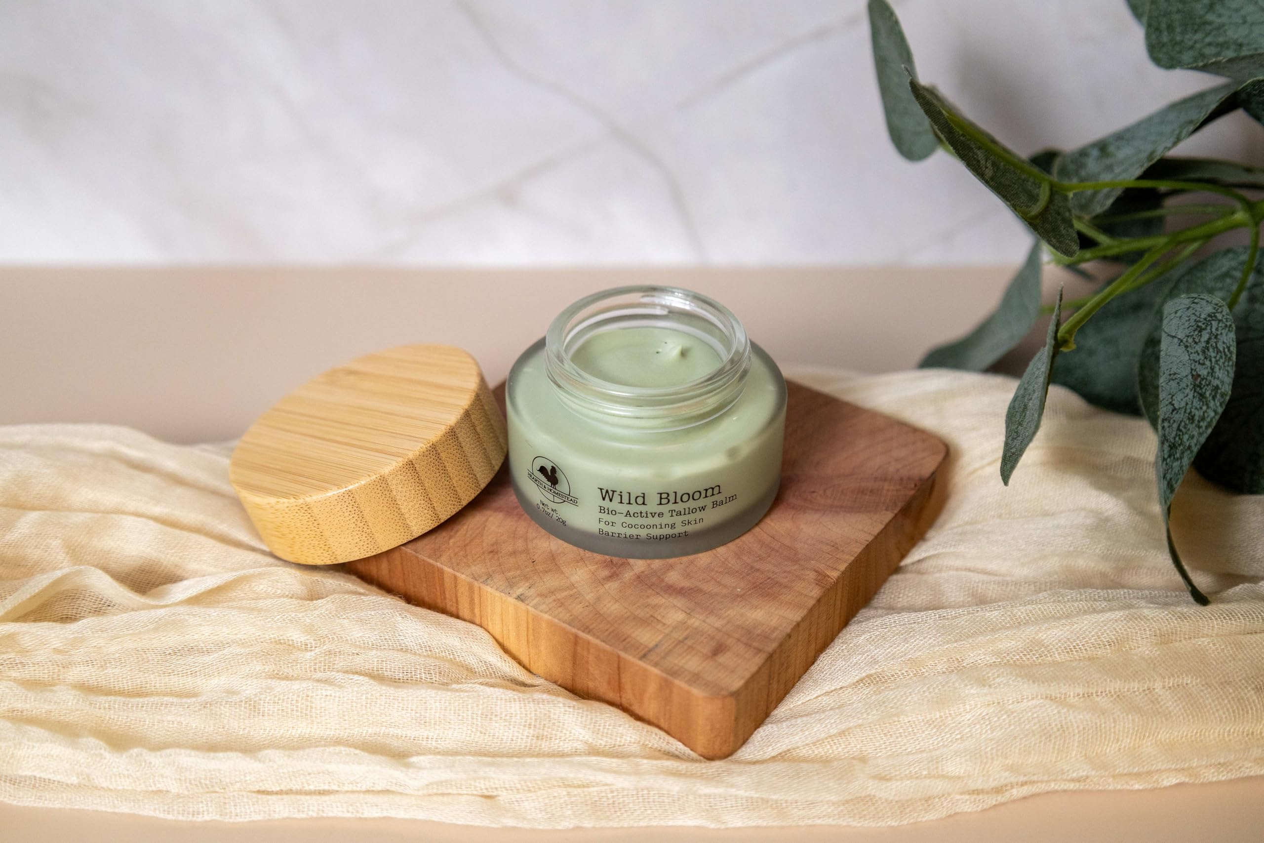 Texture swatch of Wild Bloom Balm showing fast-absorbing feel.