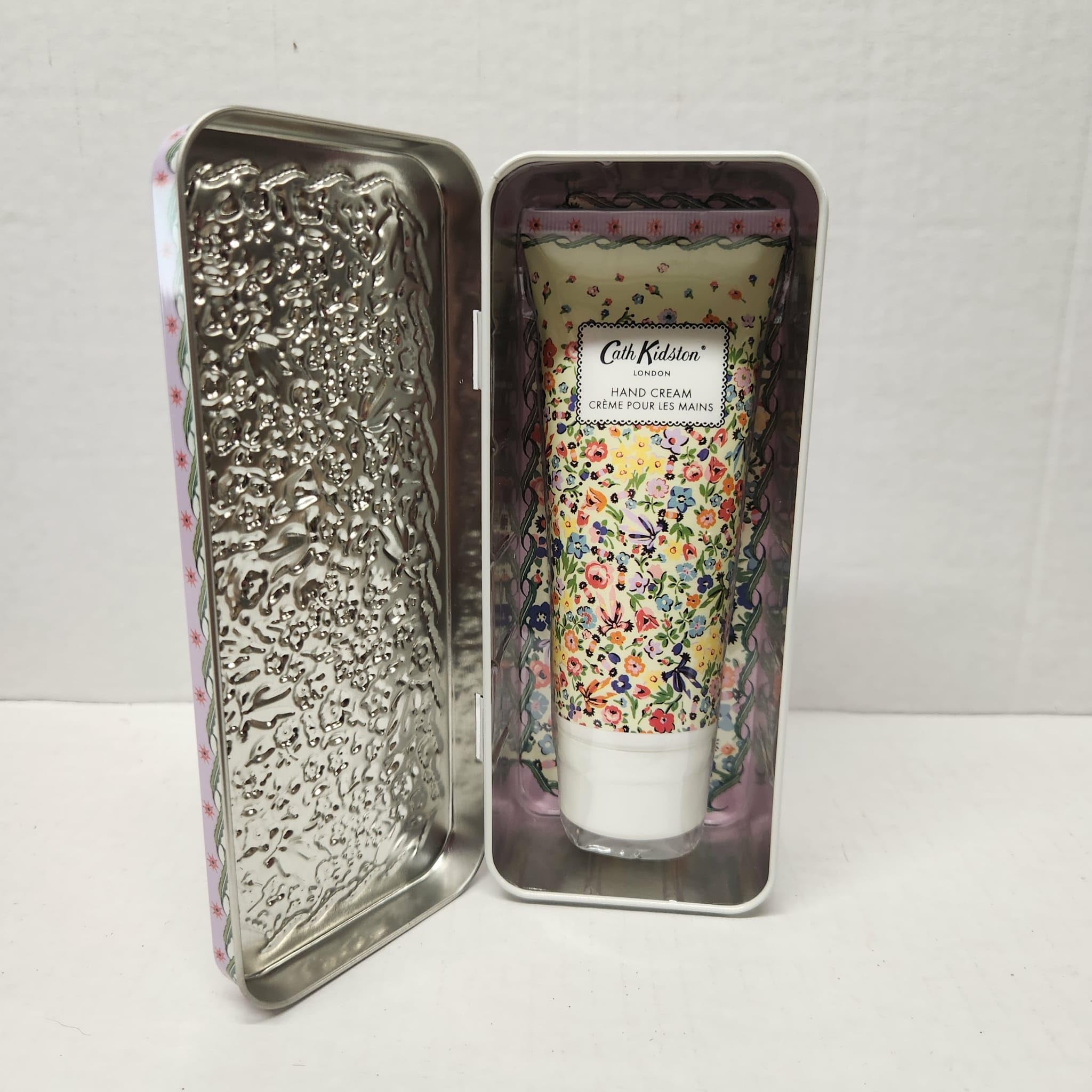 Cath Kidston mandarin-peony hand cream tin scented with mandarin and peony for a refreshing feel.