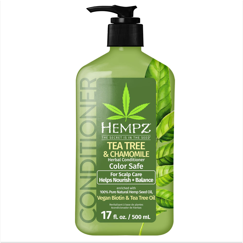 Hempz Biotin Hair Conditioner bottle pour showing hydrating formula for scalp care