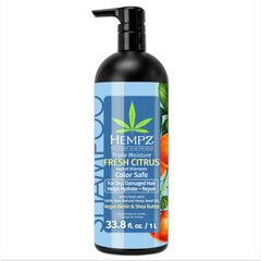 Hempz Biotin Hair Shampoo bottle pour reveals fresh citrus formula for daily cleansing and scalp refresh.