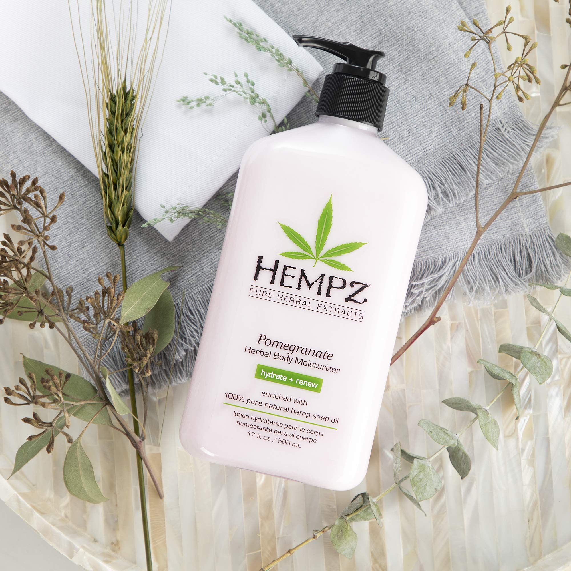 Fragrance swatch suggesting fresh pomegranate and citrus scent