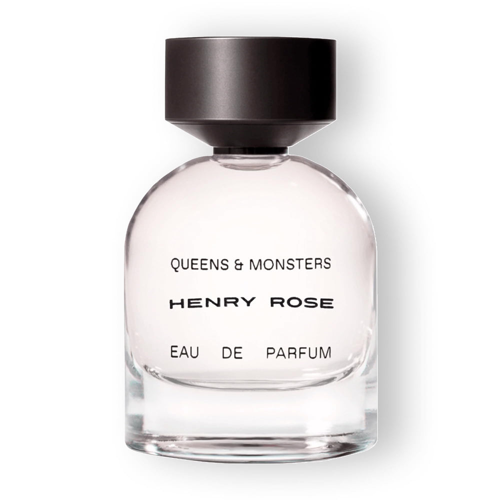 Henry Rose Queens Monsters bottle front with amber glow for daily unisex wear.